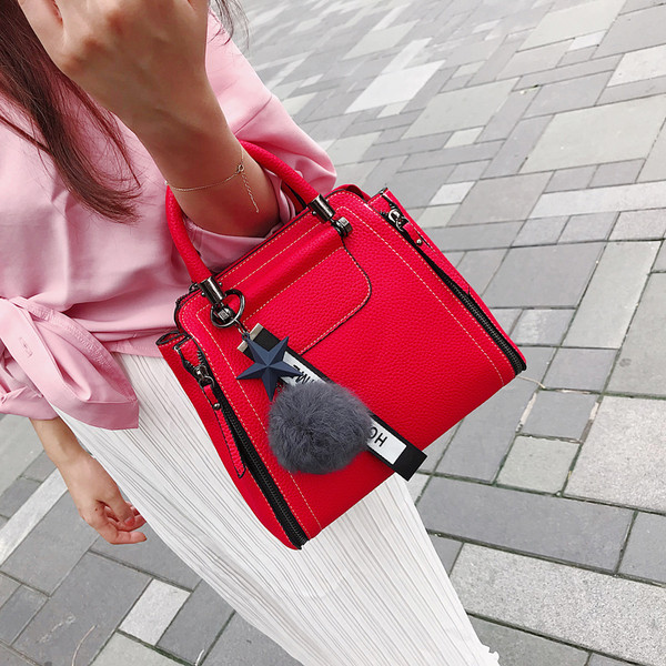 Geanta de dama moderna in negru si rosu