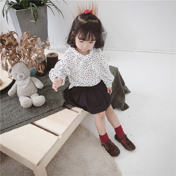 Детска риза на точки в бял и черен цвят