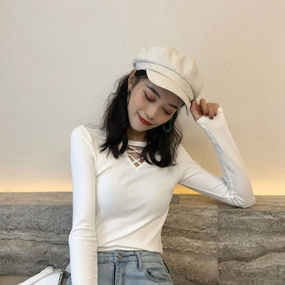 Κομψή γυναικεία μπλούζα σε μαύρο και άσπρο χρώμα