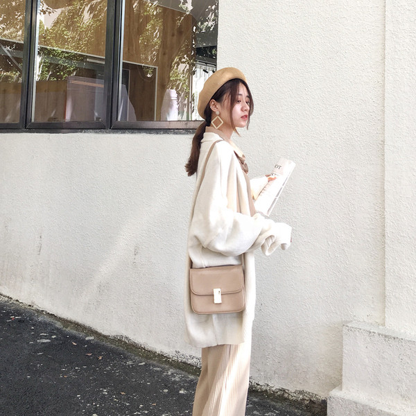 Дамска жилетка с копчета в няколко цвята