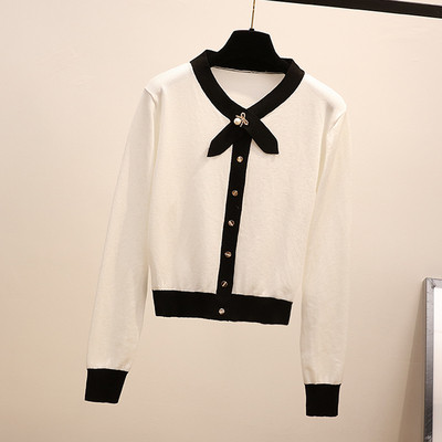 Нов модел дамска жилетка с метална декорация в бял и черен цвят