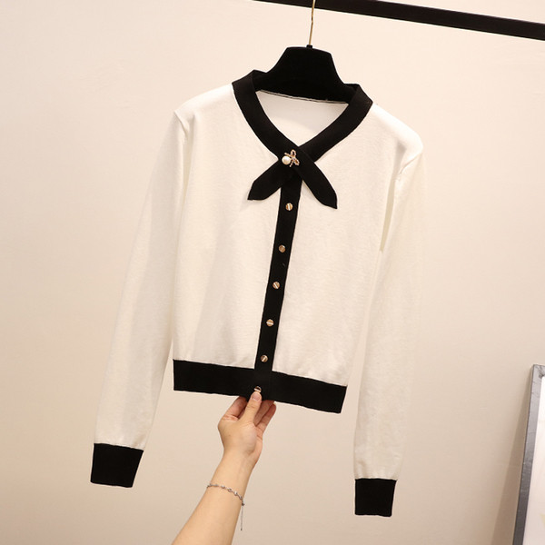 Нов модел дамска жилетка с метална декорация в бял и черен цвят