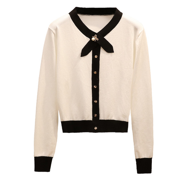 Нов модел дамска жилетка с метална декорация в бял и черен цвят