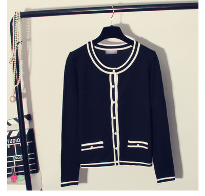 Нов модел дамска жилетка в бял и черен цвят