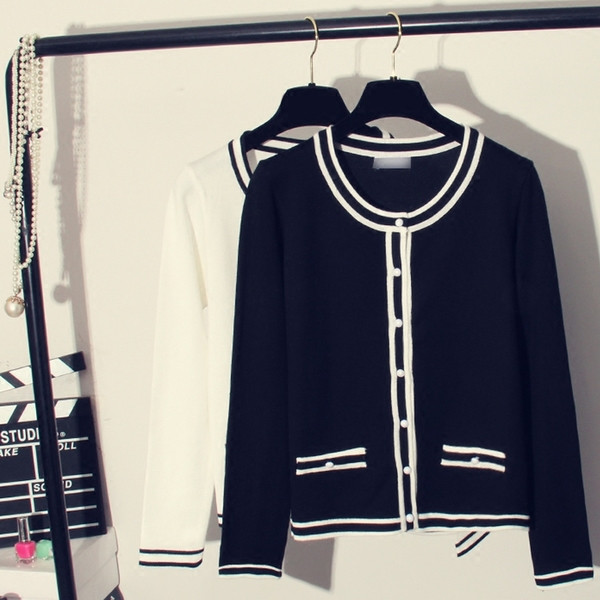 Нов модел дамска жилетка в бял и черен цвят