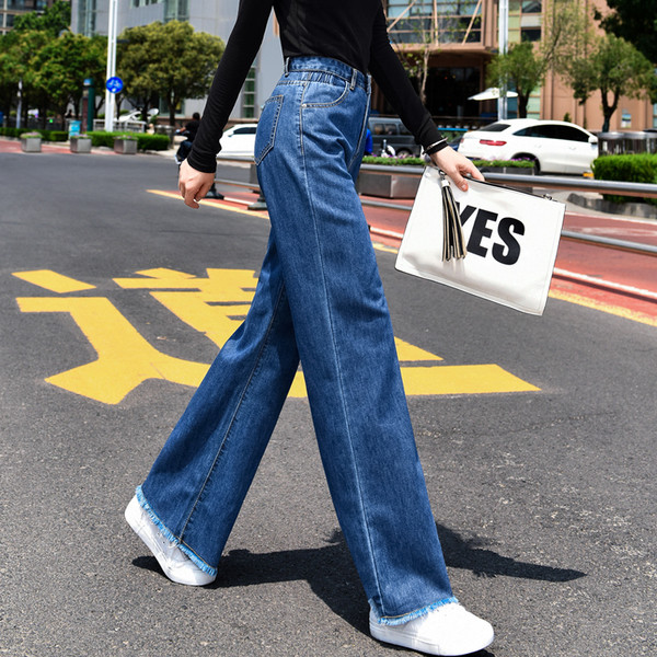 Blugi dama - model lat in culoare albastru inchis cu talie inalta