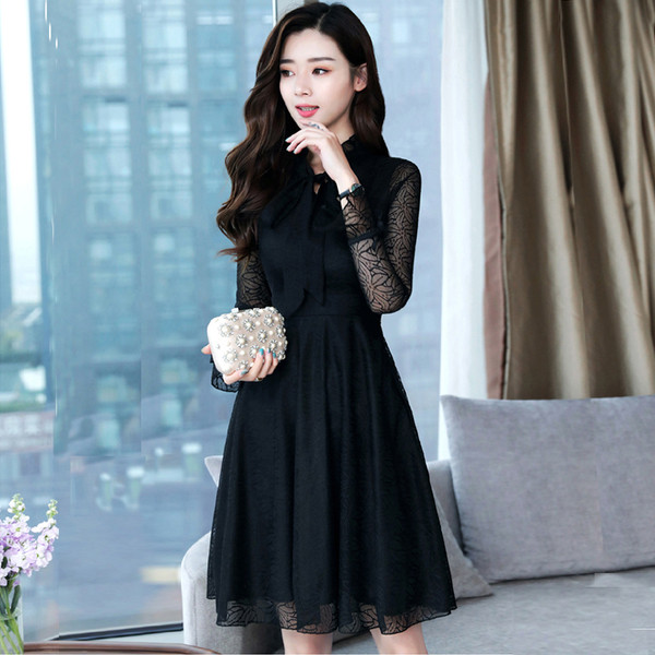 Модерна дамска рокля с дантела в бял и черен цвят