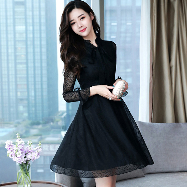 Модерна дамска рокля с дантела в бял и черен цвят