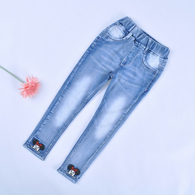 Детски дънки в тъмен и светъл цвят с метална декорация