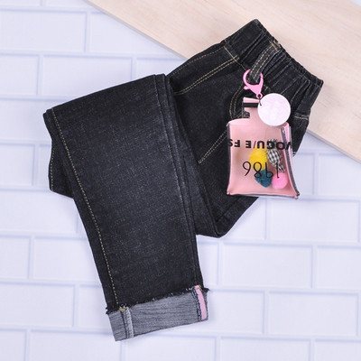 Детски дънки в тъмен и светъл цвят с метална декорация