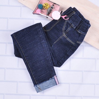 Детски дънки в тъмен и светъл цвят с метална декорация