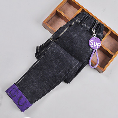 Детски дънки в тъмен и светъл цвят с метална декорация