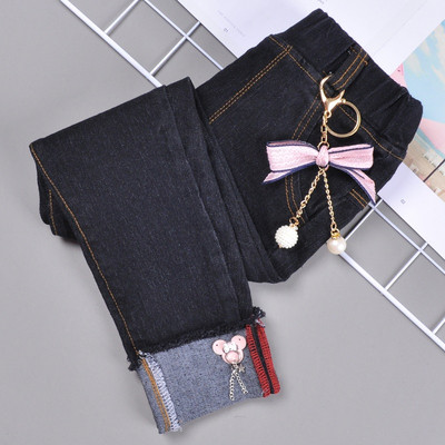 Детски дънки в тъмен и светъл цвят с метална декорация