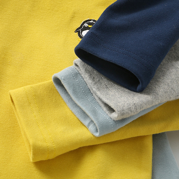 Детска блуза в няколко цвята с висока О-образна яка и бродерия