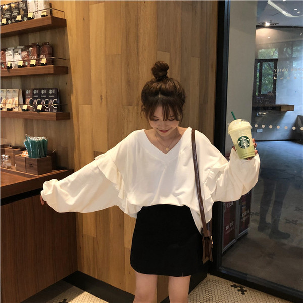 Bluză de damă cu decolteu în V în alb și verde