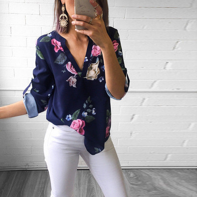 Women`s shirt with floral motifs with V-neck
