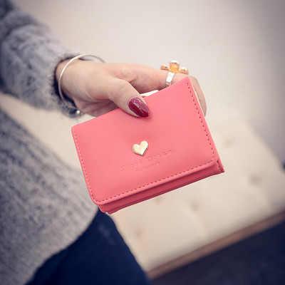 Γυναικείο δερμάτινο πορτοφόλι σε ροζ χρώμα