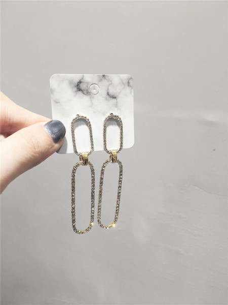 Cercei lungi moderni de dama in doua culori