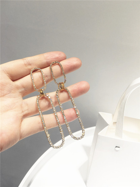 Cercei lungi moderni de dama in doua culori