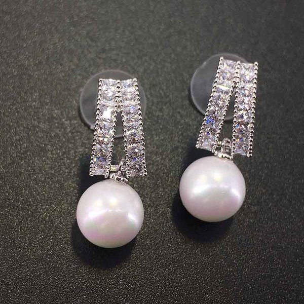 Cercei eleganti de dama cu perle decorative