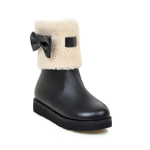 Γυναικείες χειμωνιάτικες μπότες σε επίπεδη σόλα με κορδέλα