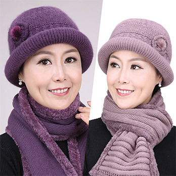 Modern women`s bowler hat with decoration in several colors
