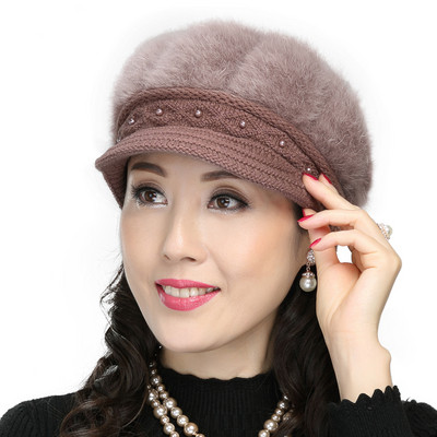 Women`s down cap with pearl element in several colors