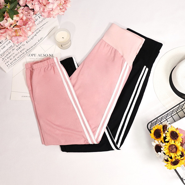 Sportnadrág terhes nőknek fekete és rózsaszín szegéllyel