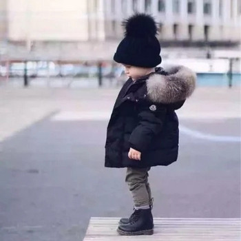 Μοντέρνο παιδικό  μπουφάν  κατάλληλο για κορίτσια και αγόρια με κουκούλα και γούνα  σε δύο χρώματα