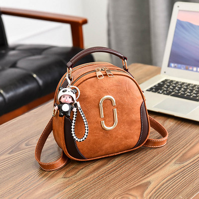 Модерна дамска раница с елемент от еко кожа в няколко цвята