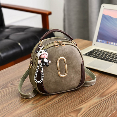 Модерна дамска раница с елемент от еко кожа в няколко цвята