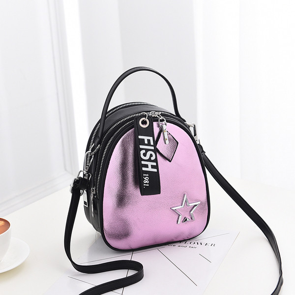 Модерна дамска раница с метален елемент в няколко цвята