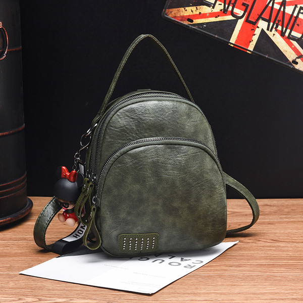 Модерна дамска раница от еко кожа с декоративен елемент в няколко цвята