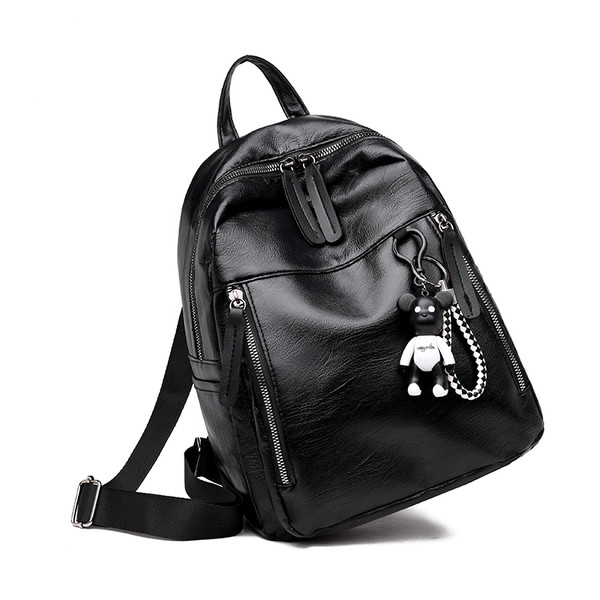 Модерна дамска раница в черен цвят от еко кожа с декорация