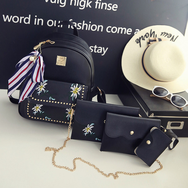 Négy részből álló készlet ökobőr hímzéssel, három színben