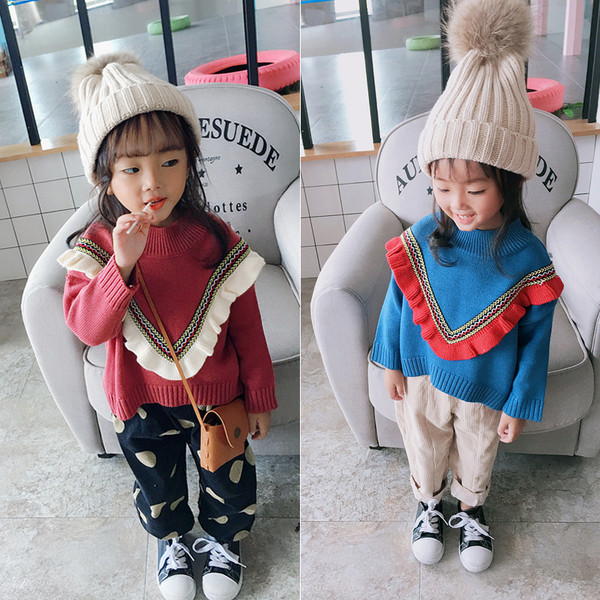 Pulover modern pentru copii pentru o fată în albastru și roșu