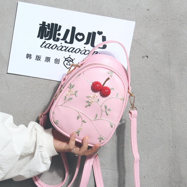 Kis női hátizsák több színben hímzéssel