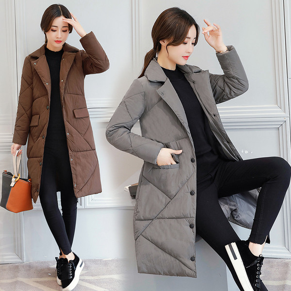 Дълго дамско яке с метални копчета и качулка в шест цвята