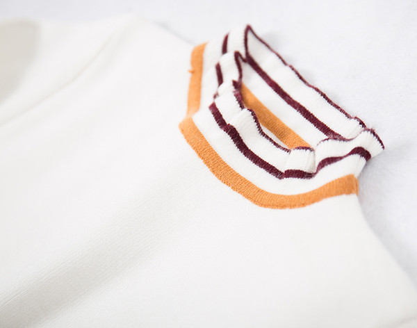 Pulover de damă subțire cu guler polo în alb-negru