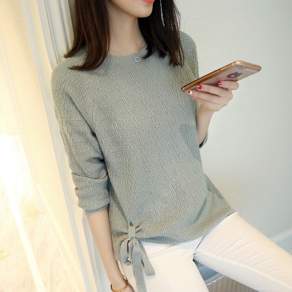 Modern női pulóver szalaggal, több színben