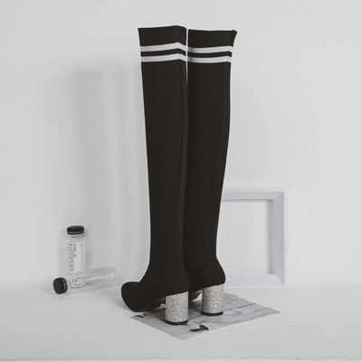 Κυρίες μοντέρνες μπότες με λαμπερό τακούνι σε δύο χρώματα