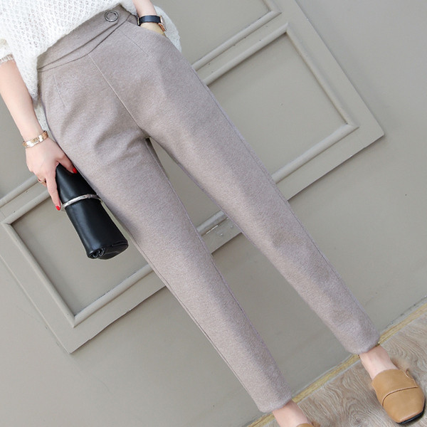 Modern női nadrág csattal, két színben