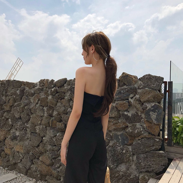 Salopetă elegantă de damă cu umerii goi, în negru