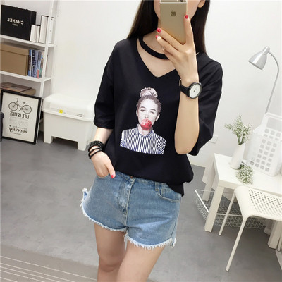 Γυναικεία κομψή μπλούζα σε μαύρο χρώμα με εκτύπωση