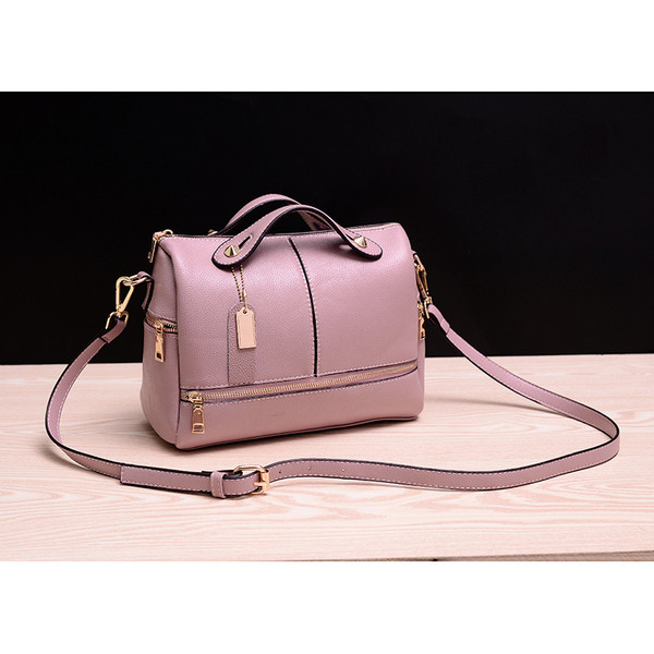 Κομψή δερμάτινη γυναικεία τσάντα με κοντή και μακρά λαβή σε διάφορα χρώματα