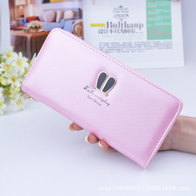 Stílusos női pénztárca fém díszítéssel