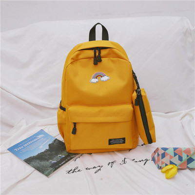 Női hátizsák színes hímzéssel és utazótáskával több színben