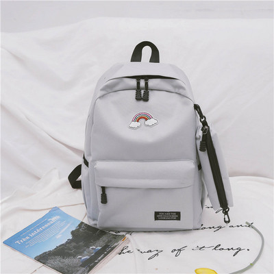 Női hátizsák színes hímzéssel és utazótáskával több színben