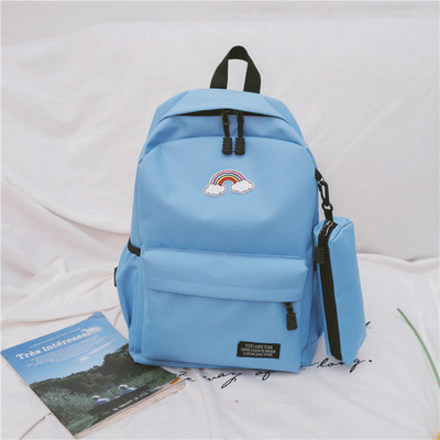 Női hátizsák színes hímzéssel és utazótáskával több színben