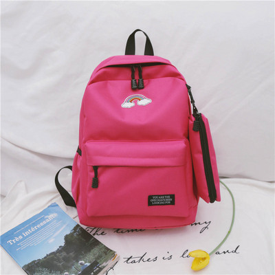 Női hátizsák színes hímzéssel és utazótáskával több színben